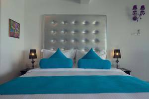 Letto o letti in una camera di Levels Unawatuna