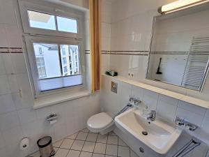 Ein Badezimmer in der Unterkunft Ferienwohnung 3 26 Inselstrand