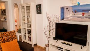 TV a/nebo společenská místnost v ubytování Casa Minina