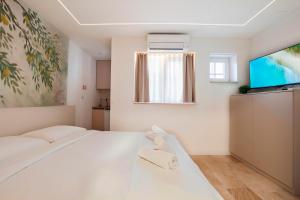Postel nebo postele na pokoji v ubytování Style rooms Split
