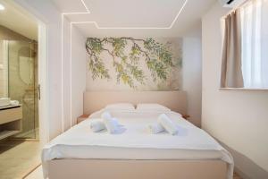Postel nebo postele na pokoji v ubytování Style rooms Split