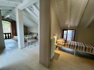 Postel nebo postele na pokoji v ubytování B&B Aria Di Lago