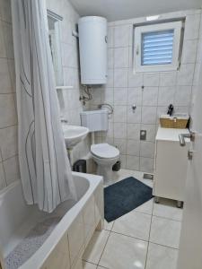 Kúpeľňa v ubytovaní Apartment Hramina