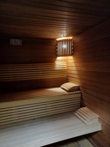 a sauna with a light on top of it at Leśny Ośrodek Szkoleniowy Nagórzyce in Swolszowice Małe