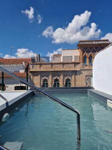 Πισίνα στο ή κοντά στο Hotel y Apartamentos Doña Lola