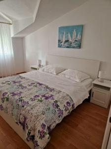 Postel nebo postele na pokoji v ubytování Apartment Hramina + 37 fotografií