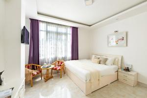 Voodi või voodid majutusasutuse AM Memory Central Hotel 2 toas