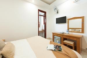 Televiisor ja/või meelelahutuskeskus majutusasutuses AM Memory Central Hotel 2
