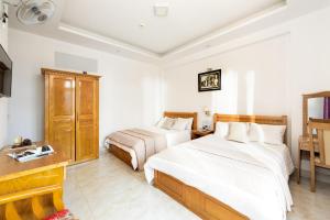 Voodi või voodid majutusasutuse AM Memory Central Hotel 2 toas