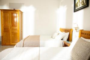Voodi või voodid majutusasutuse AM Memory Central Hotel 2 toas