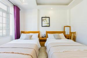 Voodi või voodid majutusasutuse AM Memory Central Hotel 2 toas