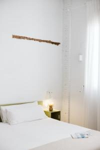 Postel nebo postele na pokoji v ubytování OttoH Charm Stay