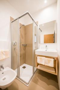Kúpeľňa v ubytovaní Apartments Drei Zinnen