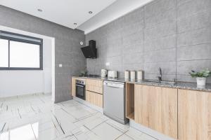 Кухня или мини-кухня в Appartement coquet de 3 pièces à Birkhadem
