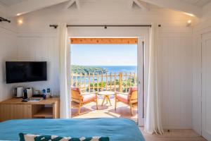 Katil atau katil-katil dalam bilik di Domaine & Villas Version Maquis +121 gambar