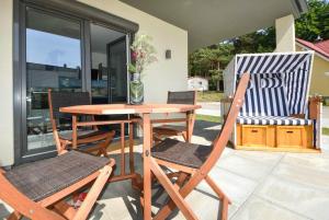 En terrasse eller udendørsområde på Sonnenpark 05