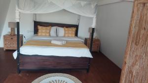 Ένα ή περισσότερα κρεβάτια σε δωμάτιο στο Villa Olivia