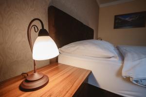 Posteľ alebo postele v izbe v ubytovaní Hotel Solisko