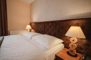 Posteľ alebo postele v izbe v ubytovaní Hotel Solisko
