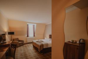 Posteľ alebo postele v izbe v ubytovaní Hotel Solisko