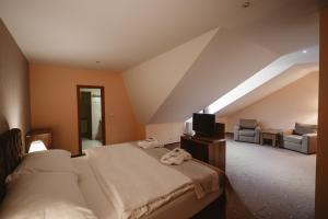 Posteľ alebo postele v izbe v ubytovaní Hotel Solisko