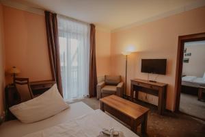 Voodi või voodid majutusasutuse Hotel Solisko toas