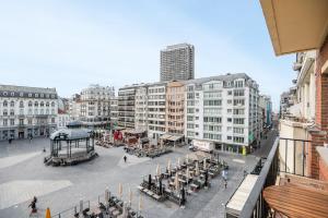 a city street with a gazebo and buildings at appartement CENTRUM 4 in Ostend