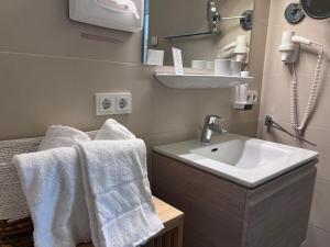 Koupelna v ubytování Strandhotel Kärntnerhof
