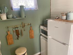 Kuchyň nebo kuchyňský kout v ubytování Chalet Sint-Hubertus