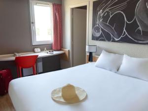 Postel nebo postele na pokoji v ubytování Hotel ibis Narbonne