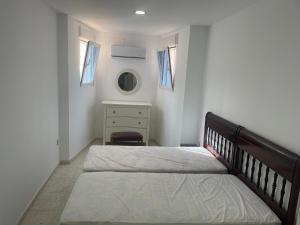 Postel nebo postele na pokoji v ubytování Ferienwohnung Benidorm