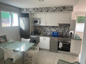 Kuchyň nebo kuchyňský kout v ubytování Ferienwohnung Benidorm