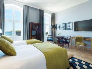 Posteľ alebo postele v izbe v ubytovaní Sofitel Grand Sopot