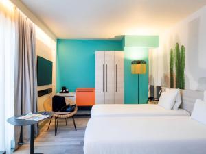 Vuode tai vuoteita majoituspaikassa Novotel Monte-Carlo