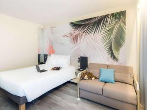 Vuode tai vuoteita majoituspaikassa Novotel Monte-Carlo