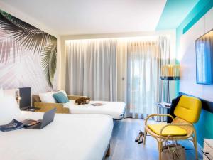 Vuode tai vuoteita majoituspaikassa Novotel Monte-Carlo