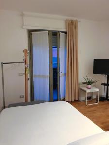 Ένα ή περισσότερα κρεβάτια σε δωμάτιο στο Serendipity home