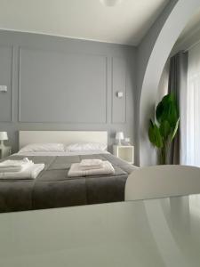 Postel nebo postele na pokoji v ubytování Quintino Sella rooms