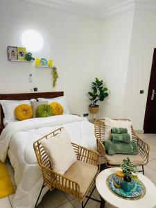 Ένα ή περισσότερα κρεβάτια σε δωμάτιο στο Appart F3 haut standing Riviera