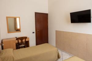 TV a/nebo společenská místnost v ubytování Hotel mariuccia