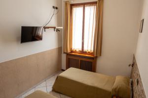 TV a/nebo společenská místnost v ubytování Hotel mariuccia