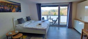 Postel nebo postele na pokoji v ubytování Apartmán Na kraji lesa