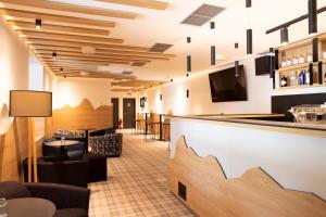TV a/nebo společenská místnost v ubytování Amenity Hotel & Resort Orlické hory