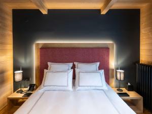Ein Bett oder Betten in einem Zimmer der Unterkunft Swissôtel Resort Kolasin