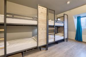 Postel nebo postele na pokoji v ubytování a&o Rotterdam City