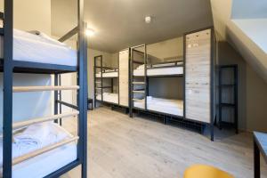 Postel nebo postele na pokoji v ubytování a&o Rotterdam City