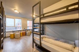 Postel nebo postele na pokoji v ubytování a&o Rotterdam City