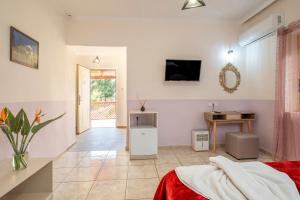Een TV en/of entertainmentcenter bij Areti Suites

