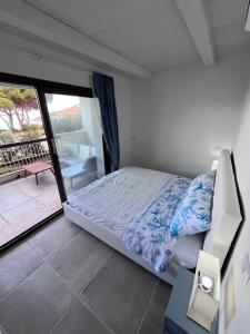 Кровать или кровати в номере Rena Bianca Residence 201