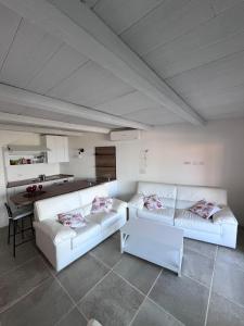 Кровать или кровати в номере Rena Bianca Residence 201